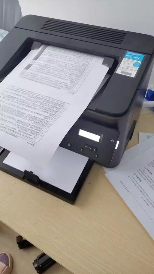 打印机打一半卡纸