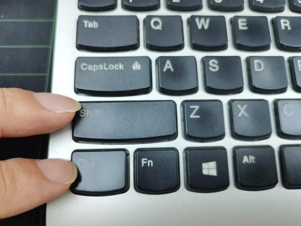 联想电脑打字出现数字怎么办截图