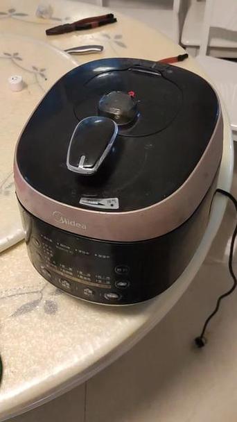 美的高压锅盖拆卸图解截图