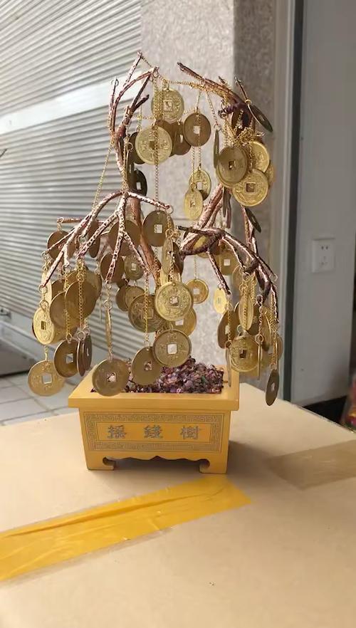用铜钱做摇钱树