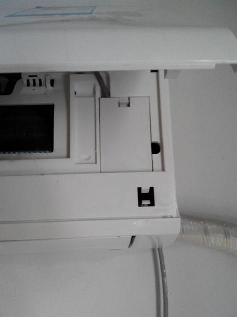 美的空调内机盖怎么打开