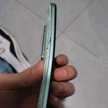 vivo手机弯了能压回来吗