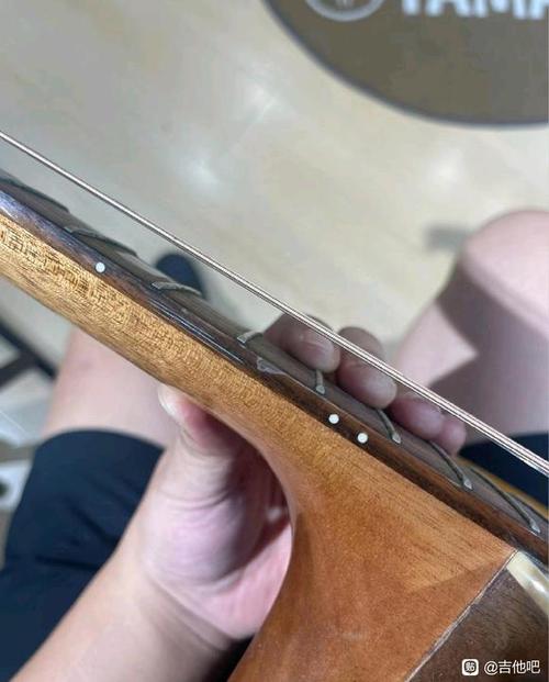 弦距太高往哪个方向