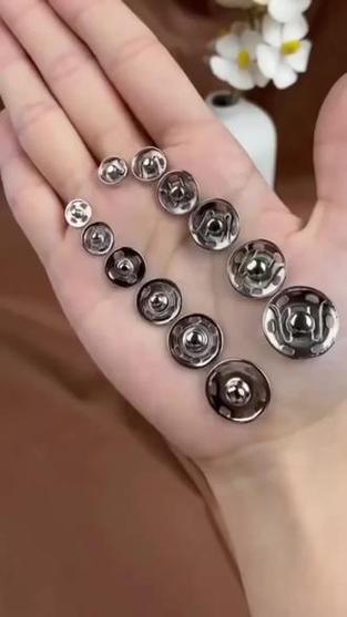 衣服换一颗按扣多少钱