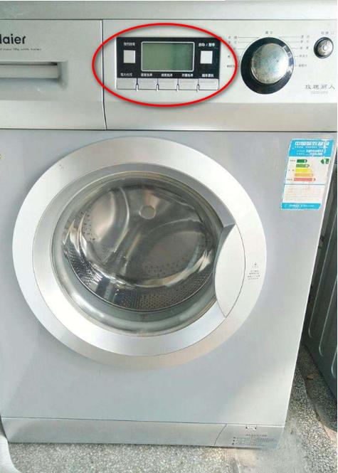 海尔洗衣机洗衣服中途怎么打开门