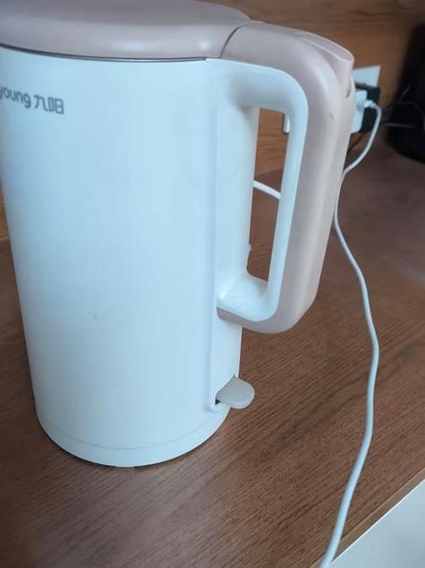 九阳热水壶底座怎么拆开
