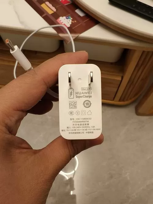 华为手机一插充电器就震动
