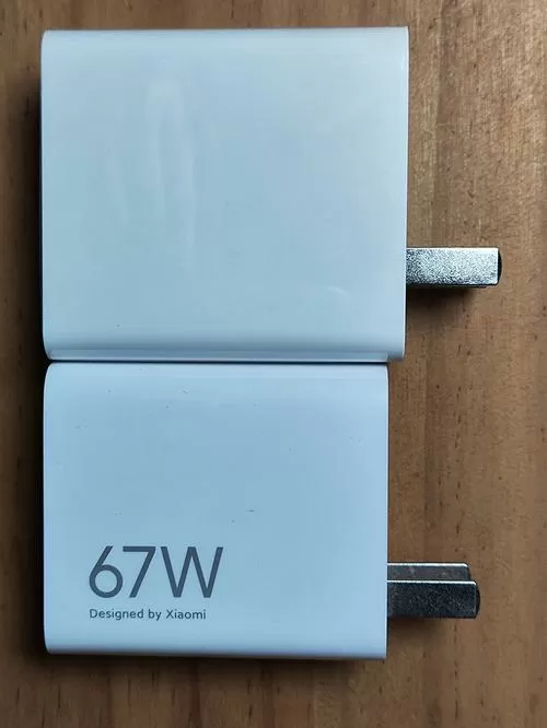 65w充电器伤手机吗