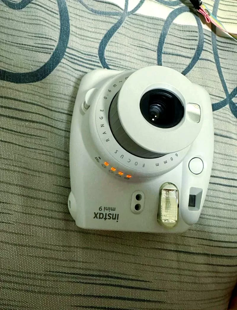 拍立得mini9指示灯一直闪烁